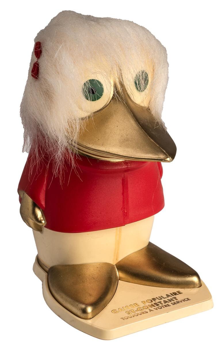 Modèle de canard fantastique avec de grands yeux, une veste rouge, des cheveux blancs et un bec doré.