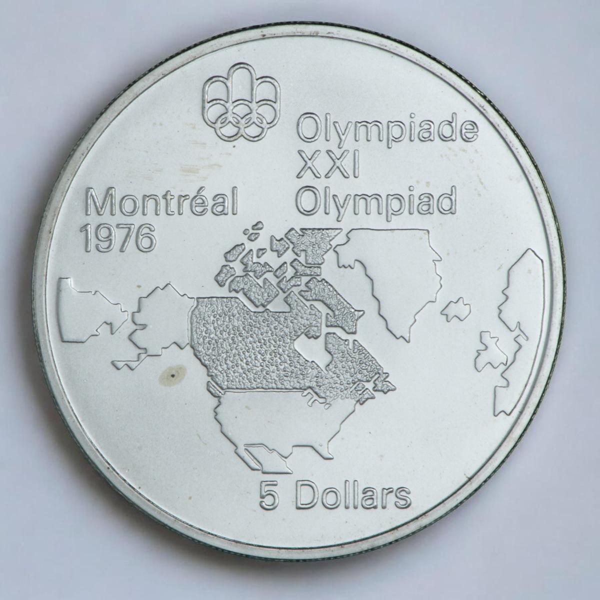 Pièce d’argent ornée d’une carte de l’Amérique du Nord avec le Canada ombré.