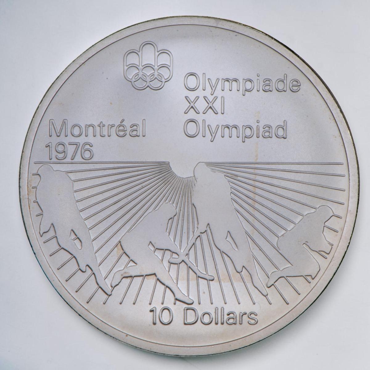 Pièce d’argent montrant des rayons de soleil sur la moitié inférieure et les silhouettes de joueurs avec des bâtons courbés.