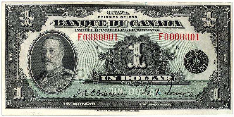 1935_1-dollar_recto_FR Billet de banque vert, motifs géométriques complexes, homme barbu en uniforme militaire portant de nombreuses médailles: le roi George V.