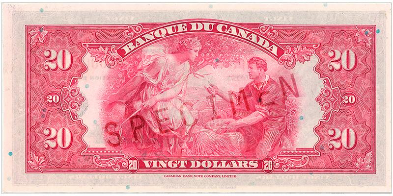 1935_20-dollar_verso_FR Billet de banque rose, motifs géométriques complexes, femme en robe tenant une canne cérémonielle, jeune homme avec du grain récolté.