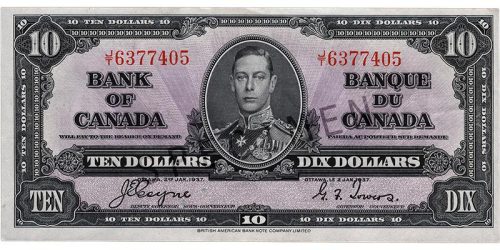 Billet de banque violet, motifs géométriques complexes, jeune homme en uniforme militaire d’époque : le roi George VI.