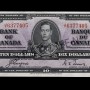Billet de banque violet, motifs géométriques complexes, jeune homme en uniforme militaire d’époque : le roi George VI.