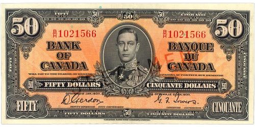 Billet de banque orange, motifs géométriques complexes, jeune homme en uniforme militaire d’époque : le roi George VI.