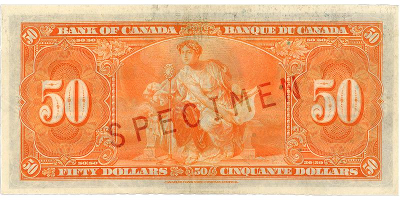 Billet de banque orange, motifs géométriques complexes, personne en robe tenant un document enroulé, devant un microphone.