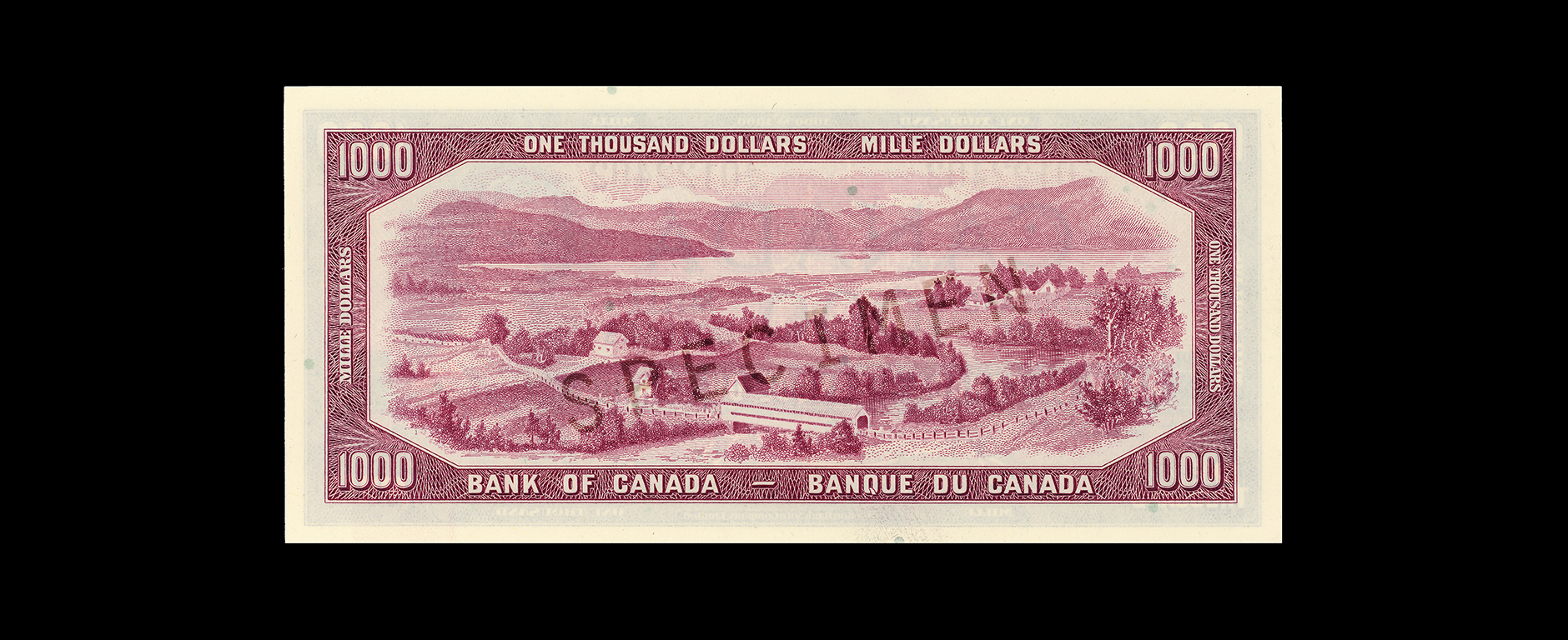 Billet de banque rose, cadre constitué de motifs géométriques, une rivière surplombée par des collines hautes, un pont couvert et des fermes à l’avant-plan.