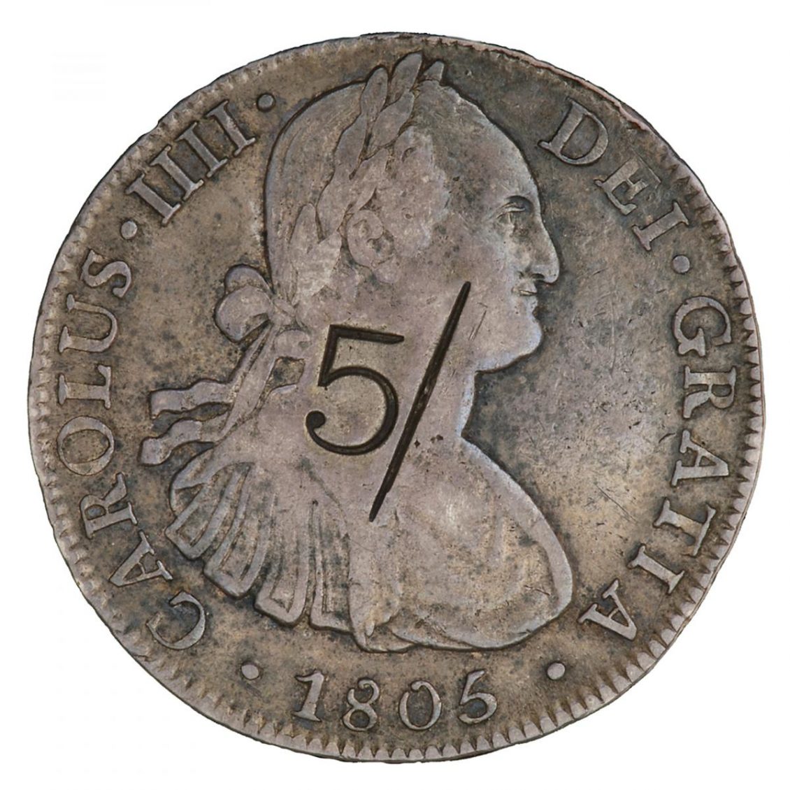 Pièce de monnaie en argent sur laquelle on peut voir le profil d’un homme coiffé d’une couronne de laurier et le chiffre « 5 » frappé par-dessus.