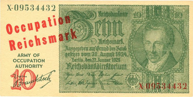 Billet de banque avec calligraphie allemande et image d’un homme portant un col montant et un nœud papillon. 