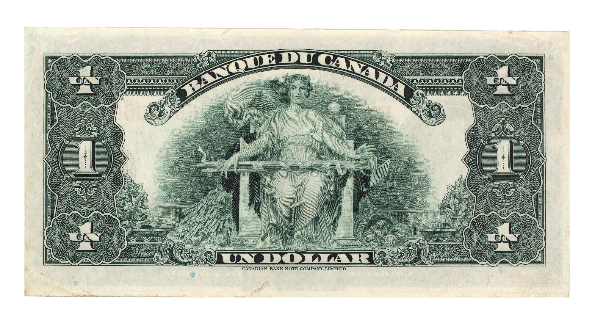 Billet de banque vert, personnage féminin assis et tenant un râteau, bordure décorative gravée.