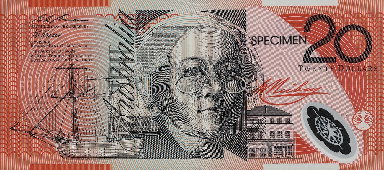 Billet de banque rouge orné du portrait d’une femme tournée vers l’avant, portant des lunettes et une chemise à col montant, cheveux couverts d’un bonnet, un navire et un bâtiment de chaque côté d’elle.