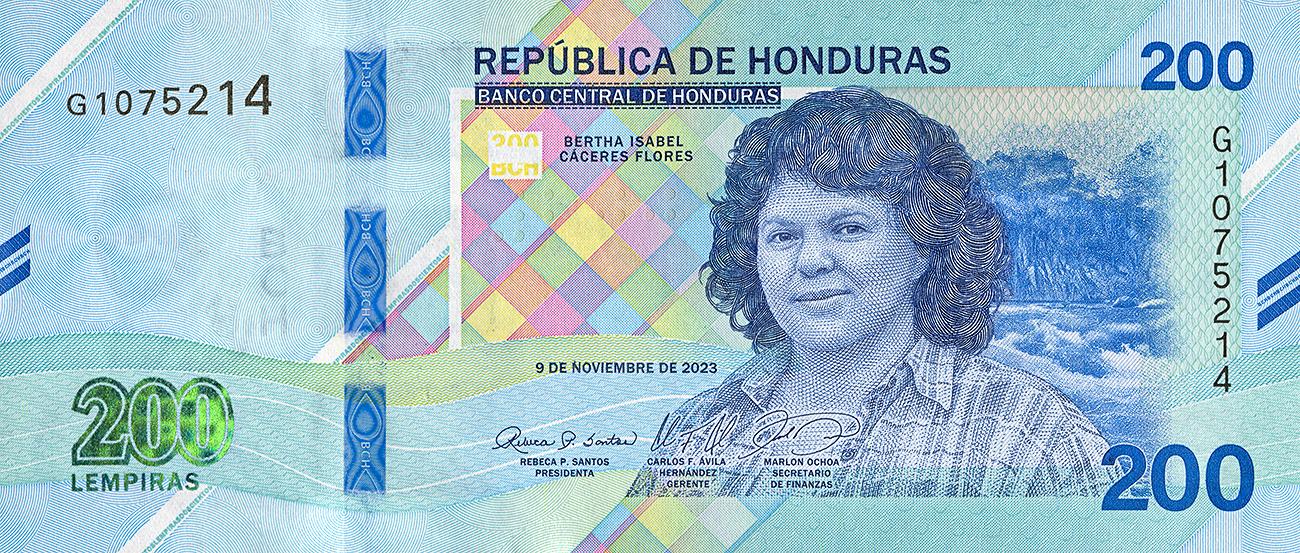 Billet de banque bleu orné du portrait d’une femme aux cheveux ondulés et à l’épaule, tournée vers l’avant et portant une chemise à carreaux.