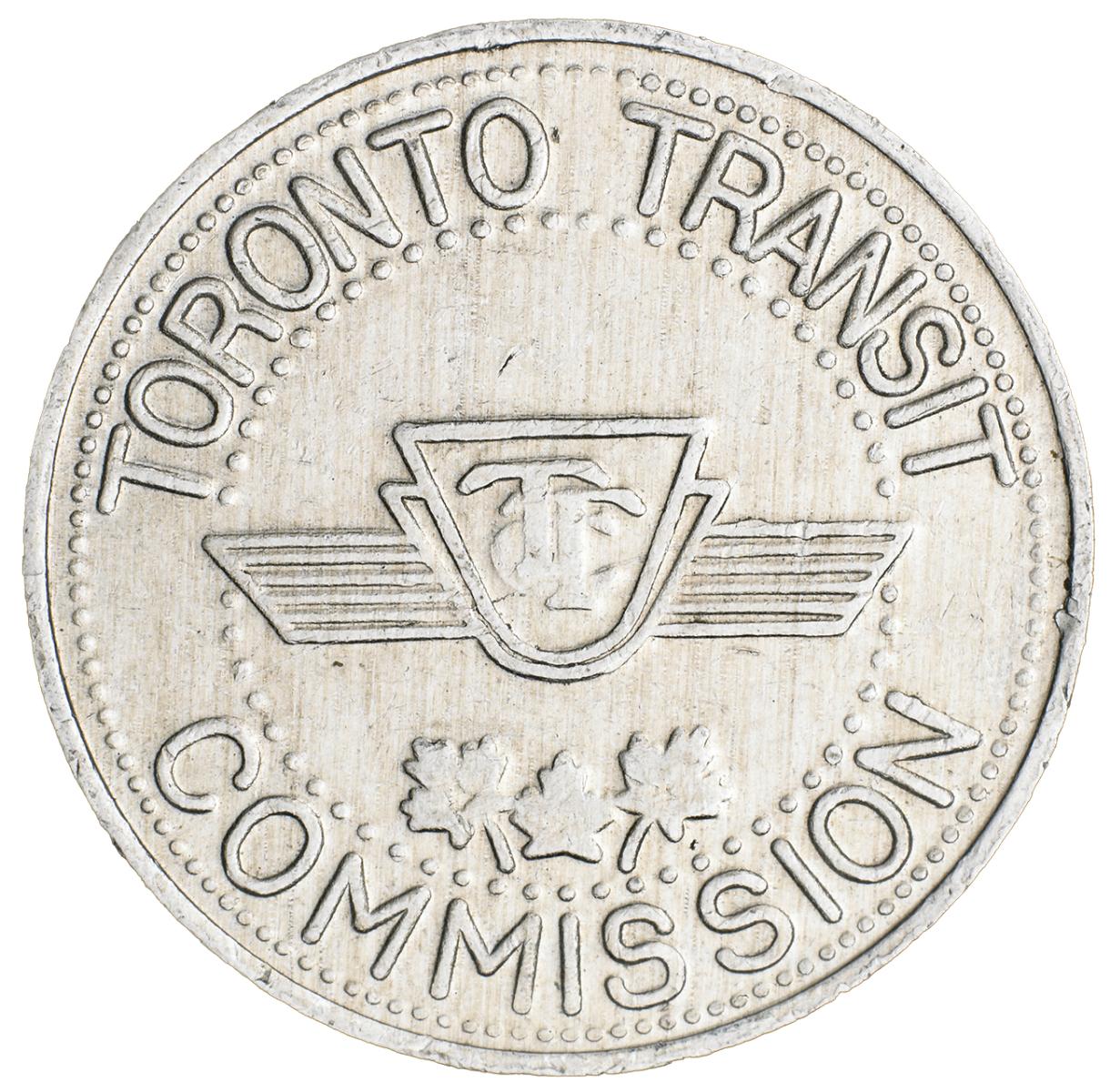 Jeton de transport en commun de Toronto Jeton rond argenté orné d’un logo affichant les lettres TTC superposées.
